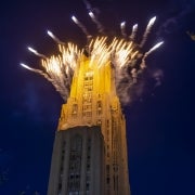 cathedral of learning with fireworks